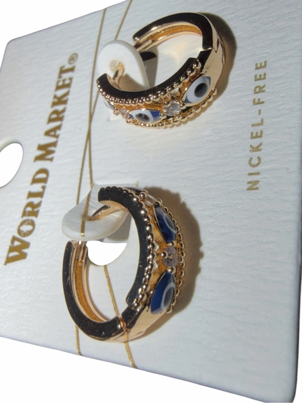 Gold Hoop Earrings with Blue and Black Evil Eye Accents